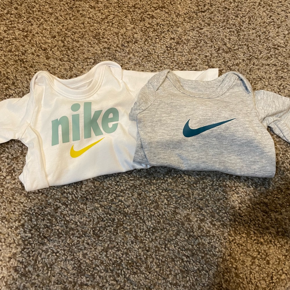 Two Nike newborn long sleeve onesies